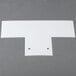 A white plastic splash guard with holes.