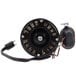 A close-up of a black Bohn electric motor with a wire attached.