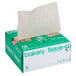 A green and white box of Durable Packaging bakery tissue paper with brown tissue inside.