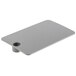 A grey rectangular metal plate with a hole in the middle.
