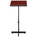 An Oklahoma Sound mahogany portable presentation lectern on a black stand.