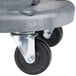 A gray plastic dolly wheel attachment.