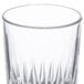 A clear Libbey Winchester highball glass with a wavy design.