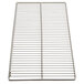 A stainless steel metal grate with holes.