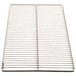 A stainless steel metal rack with holes.