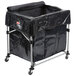 A black plastic Rubbermaid cover for a garbage cart.