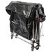 A black tarp on a Rubbermaid collapsible cart.