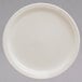 A white Homer Laughlin narrow rim china plate.