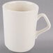 A Homer Laughlin ivory china mug with a handle.