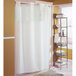 A Hookless beige shower curtain with a translucent window and corner magnets hanging in a bathroom.