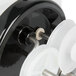 A close-up of a black and white Nemco Shaft Seal.