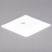 A white rectangular CAC porcelain dinner plate.
