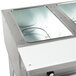 An Eagle Group stainless steel open well hot food table with three pans.