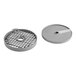 A round grey metal dicing kit with a hole.