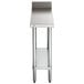 A Regency stainless steel equipment filler table with a galvanized undershelf.