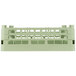 A Vollrath green plastic dish rack with two compartments.