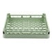 A light green plastic Vollrath dish rack with holes in it.