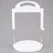 A white plastic stand with a handle.