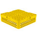 A Vollrath yellow plastic dish rack with an extender.