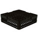A Vollrath Traex black plastic rack with holes and an extender.