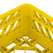 A yellow Vollrath Traex dish rack with extenders and a handle.