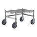 A Regency chrome-plated metal dunnage rack with black wheels.