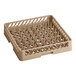 A beige plastic Vollrath dish rack with many spikes and holes.