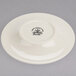 A Homer Laughlin ivory china saucer with a logo on it.
