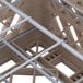 A beige Vollrath Traex Plate Crate with wire compartments.