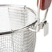 A Thunder Group stainless steel strainer/blanching basket with a wooden handle.