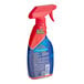 A red and blue OxiClean Max Force Stain Remover spray bottle.