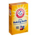 A yellow Arm & Hammer box of baking soda on a kitchen counter.