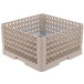 A beige plastic Vollrath Plate Crate with white metal bars.