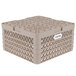 A beige plastic Vollrath Traex Plate Crate with holes.