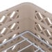 A beige Vollrath Traex plate rack with plastic dividers.