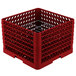 A red plastic Vollrath Traex plate rack with metal grate.