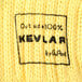 A close up of a yellow knitted fabric.