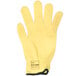 A yellow Cordova cut resistant glove with a black band and logo.