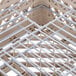 A close-up of a beige plastic grid.