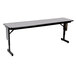 A rectangular gray granite Correll seminar table with black panel legs.