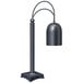 A Hatco Decorative Carving Station Lamp with a black metal shade.