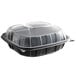 A black plastic 3-compartment container with a clear lid.