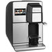 A black and silver Bunn My Cafe single cup coffee machine on a counter.