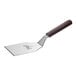 A Mercer Culinary Hell's Handle heavy-duty square edge turner with a wooden handle.