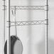 A Regency chrome hanger rail with a pan hanging from it.