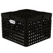 A black plastic Vollrath Traex Plate Crate with 12 compartments.