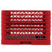 A red plastic Vollrath Traex Plate Crate with compartments.