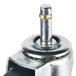 A Carlisle metal swivel stem caster with a metal wheel.
