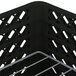 A black plastic Vollrath Traex Plate Crate with white metal rods.
