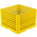 A yellow Vollrath Traex Plate Crate with compartments for holding plates.